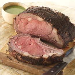 Pepper-Crusted Rib Roast with Three-Herb Hazelnut Pesto