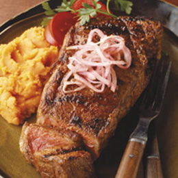 Paprika Rubbed Steaks with Pickled Onions