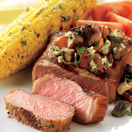 Strip Steaks with Mushrooms, Bacon, and Blue Cheese